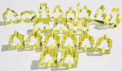 Complete 19 piece yellow transparent set of Carcassonne meeples